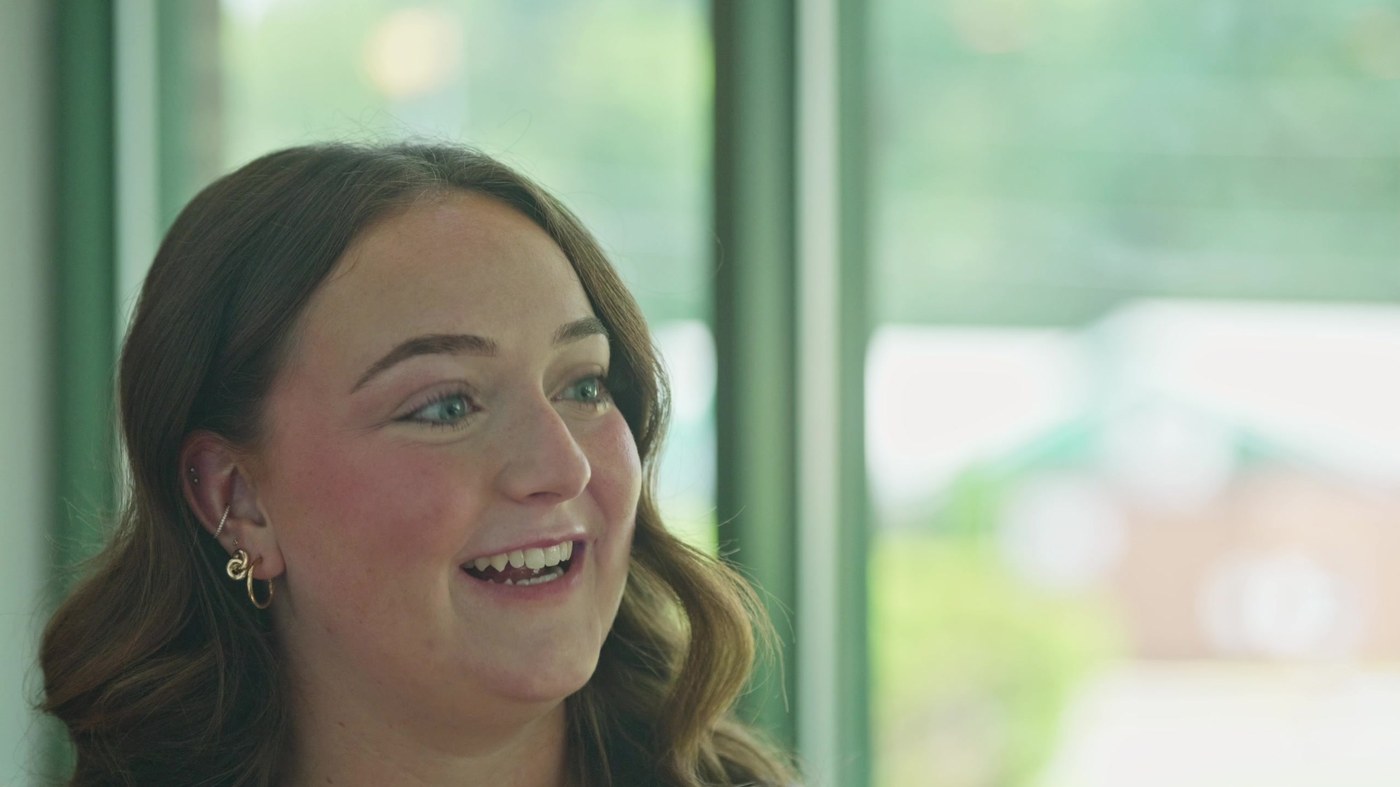 Meg Butterworth, veterinary assistant at Town and Country Animal Hospital and fourth-year veterinary student, laughing during her interview