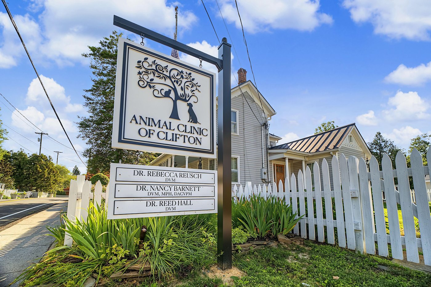 The Animal Clinic of Clifton sign on Chapel Road, listing Dr. Rebecca Reusch, Dr. Nancy Barnett and Dr. Reed Hall